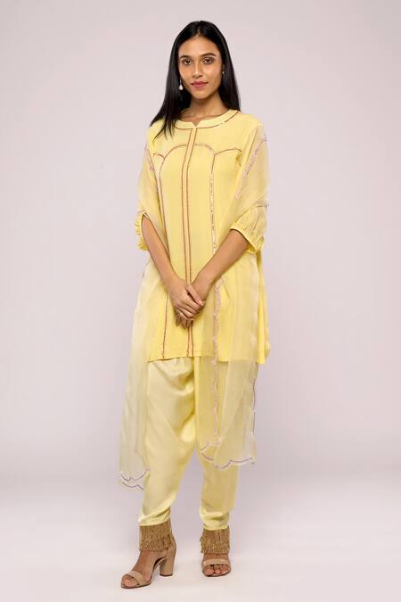 Shop Mayu Kothari Yellow Satin Modal Hand Embroidered Latkans Hem Patiala Pant at Aza Fashions Shop_Mayu Kothari_Yellow Satin Modal Hand Embroidered Latkans Hem Patiala Pant _at_Aza_Fashions