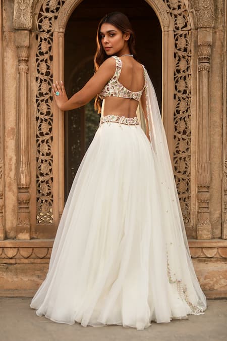 Shop Dheeru Taneja Ivory Crepe, Organza Beads, Embroidery, Zari V-neck Aiza Waistband Lehenga Set at Aza Fashions Shop_Dheeru Taneja_Ivory Crepe, Organza Beads, Embroidery, Zari V-neck Aiza Waistband Lehenga Set _at_Aza_Fashions