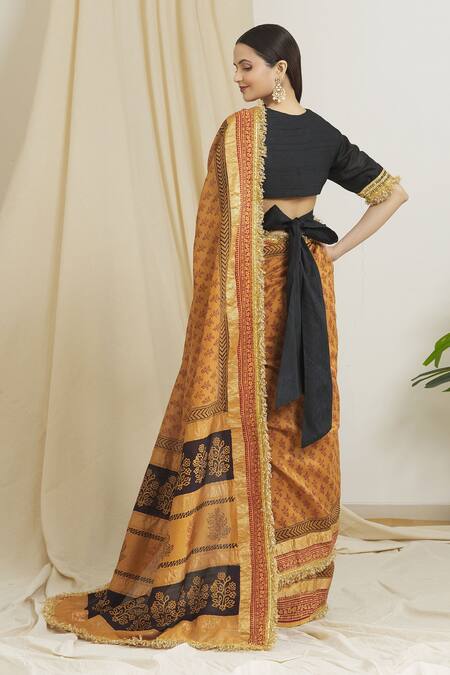 Shop Surendri Orange Raw Silk, Kotadoria Floral V Neck Hand Block Print Saree With Blouse at Aza Fashions Shop_Surendri_Orange Raw Silk, Kotadoria Floral V Neck Hand Block Print Saree With Blouse_at_Aza_Fashions