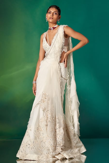 Shop Stotram Ivory Embroidery Sequins Plunge V Floral Pre-draped Saree With Blouse at Aza Fashions Shop_Stotram_Ivory Embroidery Sequins Plunge V Floral Pre-draped Saree With Blouse_at_Aza_Fashions