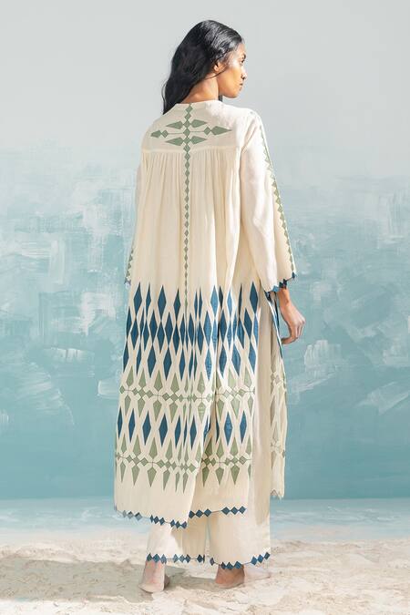 Shop Ikai By Ragini Ahuja Ivory Cotton Cut Work, Applique Nile Cut-work Hem Pant at Aza Fashions Shop_Ikai By Ragini Ahuja_Ivory Cotton Cut Work, Applique Nile Cut-work Hem Pant_at_Aza_Fashions