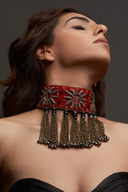 Shop Knotmecute Orange Artificial Stones Sun And Moon Motif Embellished Choker at Aza Fashions Shop_Knotmecute_Orange Artificial Stones Sun And Moon Motif Embellished Choker_at_Aza_Fashions