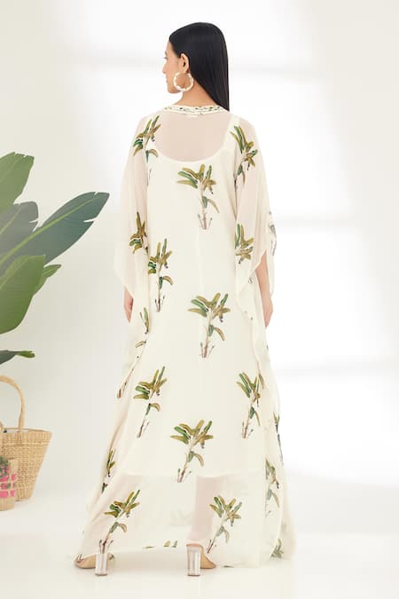 Shop Nikasha Off White Georgette Banana Tree V Neck Hand Painted Kaftan at Aza Fashions Shop_Nikasha_Off White Georgette Banana Tree V Neck Hand Painted Kaftan _at_Aza_Fashions