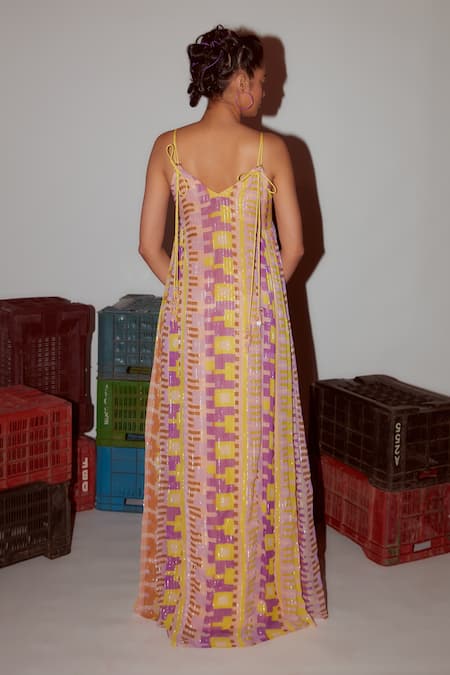 Shop Nirmooha Yellow Lurex Tassels V-neck Geometric Print Rivet Detail Dress at Aza Fashions Shop_Nirmooha_Yellow Lurex Tassels V-neck Geometric Print Rivet Detail Dress _at_Aza_Fashions
