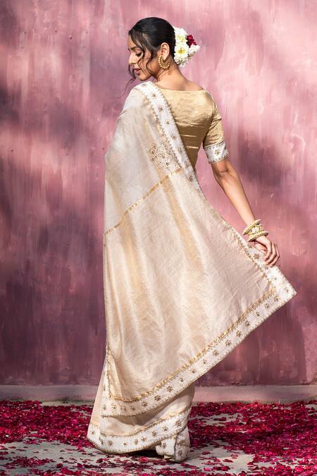 Shop_Weaver Story_Off White Chanderi Embroidery Thread Floral Border Saree _at_Aza_Fashions