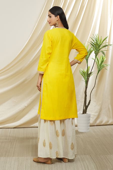 Shop Peenacolada Yellow Cotton, Muslin Gota Patti, Zari, Foil Printing Round Neck Gharara Set at Aza Fashions Shop_Peenacolada_Yellow Cotton, Muslin Gota Patti, Zari, Foil Printing Round Neck Gharara Set _at_Aza_Fashions