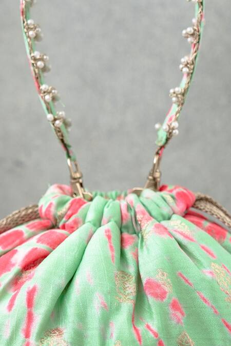 Shop Amyra Green Embroidery, Tassels Shibori Pattern Bucket Bag at Aza Fashions Shop_Amyra_Green Embroidery, Tassels Shibori Pattern Bucket Bag_at_Aza_Fashions