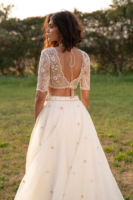 Shop_Zoon_Off White Net, Silk Organza Sequins, Floral Embellished Blouse Lehenga Set _at_Aza_Fashions
