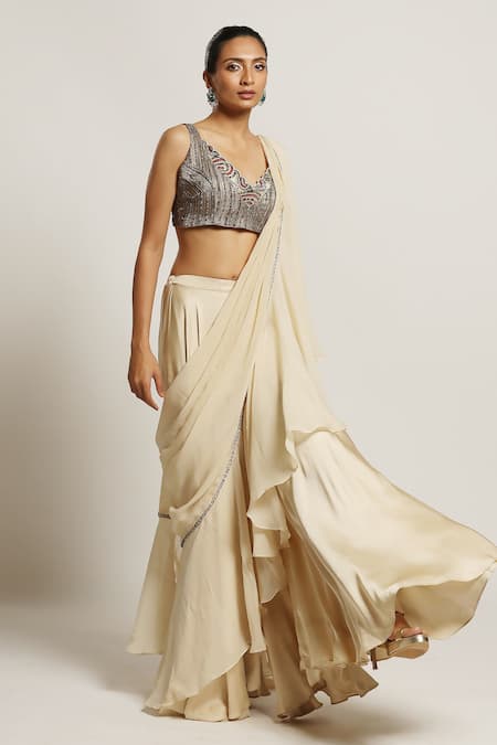 Shop Sejal Kamdar Beige Organza Embroidery Cutdana Ruffle Pant Saree With Blouse at Aza Fashions Shop_Sejal Kamdar_Beige Organza Embroidery Cutdana Ruffle Pant Saree With Blouse _at_Aza_Fashions