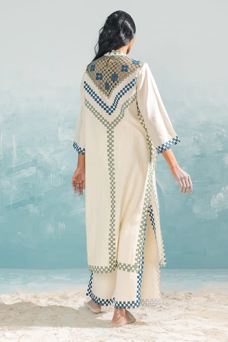 Shop_Ikai By Ragini Ahuja_Ivory 100% Cotton Embroidery Applique And Cutwork Nile Slit Pant  _at_Aza_Fashions