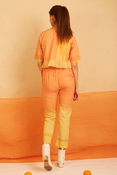 Shop Banana Labs Orange Cotton Embroidery Round Neck Pumpkin Printed Crop Top And Pant Set at Aza Fashions Shop_Banana Labs_Orange Cotton Embroidery Round Neck Pumpkin Printed Crop Top And Pant Set _at_Aza_Fashions