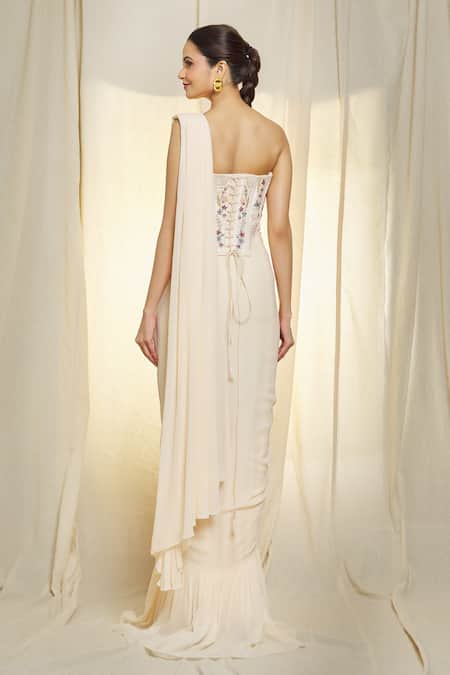 Shop Vivek Patel Ivory Georgette Pearls, Sequins, Embroidery Ruffle Pre-draped Saree With Corset at Aza Fashions Shop_Vivek Patel_Ivory Georgette Pearls, Sequins, Embroidery Ruffle Pre-draped Saree With Corset _at_Aza_Fashions