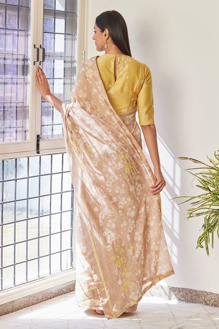 Shop Vaayu Beige Cotton, Muslin Embroidery Floral Discharge Print Saree at Aza Fashions Shop_Vaayu_Beige Cotton, Muslin Embroidery Floral Discharge Print Saree_at_Aza_Fashions