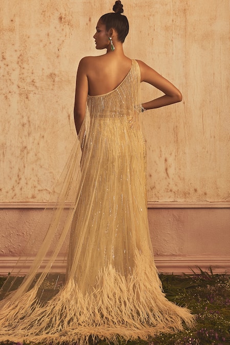 Shop Shivani Awasty Beige Net Beads, Sequins One Shoulder Renne Gown With Trail at Aza Fashions Shop_Shivani Awasty_Beige Net Beads, Sequins One Shoulder Renne Gown With Trail _at_Aza_Fashions