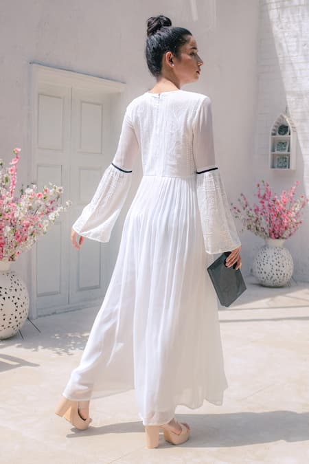Shop_Monk & Mei By Sonia Anand_White Georgette Embroidery Round Neck Chikankari Flared Jumpsuit _at_Aza_Fashions