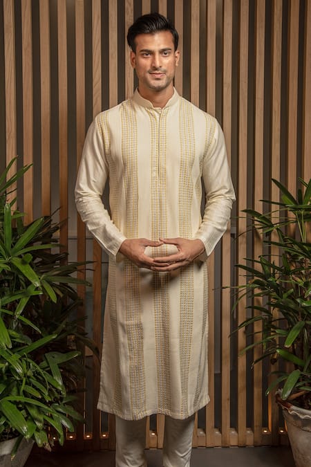 Shop Darshika Menswear Ivory Cotton, Silk Embroidery Linear Pattern Kurta Set at Aza Fashions Shop_Darshika Menswear_Ivory Cotton, Silk Embroidery Linear Pattern Kurta Set _at_Aza_Fashions