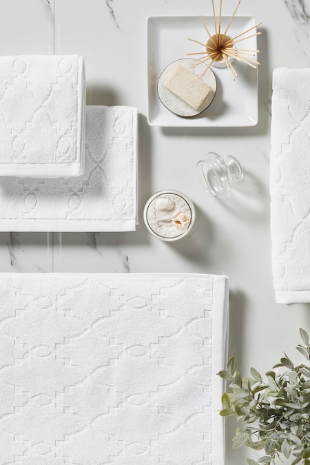 Shop Houmn White 100% Cotton Weaves Geometric Pattern Form Towel Set at Aza Fashions Shop_Houmn_White 100% Cotton Weaves Geometric Pattern Form Towel Set_at_Aza_Fashions