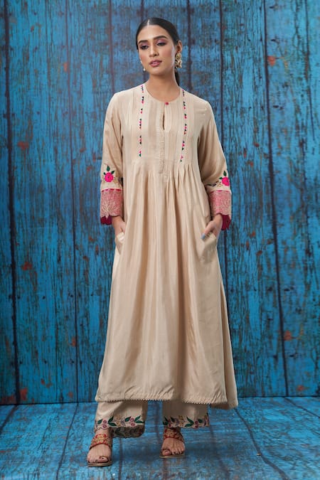 Shop Label Niti Bothra Ivory Silk Round Pintuck Kurta And Palazzo Set at Aza Fashions Shop_Label Niti Bothra_Ivory Silk Round Pintuck Kurta And Palazzo Set _at_Aza_Fashions