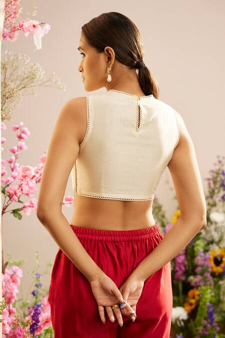 Shop Chandrima Ivory Chanderi Cut Work V-neck Cross Pleated Top at Aza Fashions Shop_Chandrima_Ivory Chanderi Cut Work V-neck Cross Pleated Top _at_Aza_Fashions