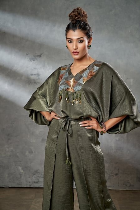 Shop Aditi Somani Green Silk Suede Sequins, Beads And Thread Work V Crop Top & Panelled Pant Set at Aza Fashions Shop_Aditi Somani_Green Silk Suede Sequins, Beads And Thread Work V Crop Top & Panelled Pant Set _at_Aza_Fashions