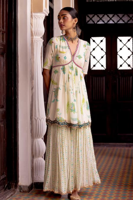 Shop Rajiramniq Ivory Organza, Crepe Floral, Sequins V Neck Fariba Flower Print Gharara Set at Aza Fashions Shop_Rajiramniq_Ivory Organza, Crepe Floral, Sequins V Neck Fariba Flower Print Gharara Set _at_Aza_Fashions