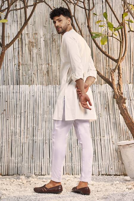 Shop Charkhee Off White Cotton, Poplin Mandarin Collar Short Kurta And Salwar Set at Aza Fashions Shop_Charkhee_Off White Cotton, Poplin Mandarin Collar Short Kurta And Salwar Set_at_Aza_Fashions