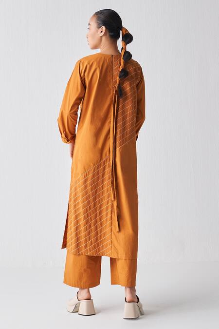 Shop Three Orange Poplin, Handloom Cotton, Chanderi Round Stripe Pattern Tunic Pant Set at Aza Fashions Shop_Three_Orange Poplin, Handloom Cotton, Chanderi Round Stripe Pattern Tunic Pant Set_at_Aza_Fashions