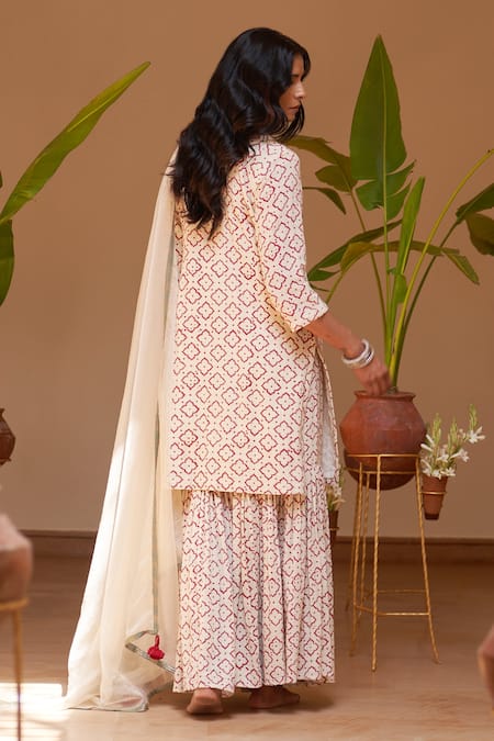 Shop Rekha Agra Red Cotton, Organza Mirrors, Embroidery Quatrefoil Print Kurta And Gharara Set at Aza Fashions Shop_Rekha Agra_Red Cotton, Organza Mirrors, Embroidery Quatrefoil Print Kurta And Gharara Set _at_Aza_Fashions