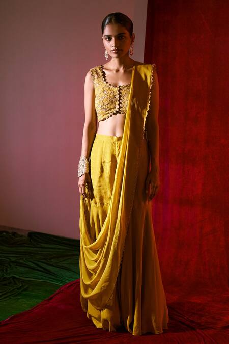Shop 17:17 By Simmi Saboo Yellow Muslin Silk And Organza Thread & Sharara Saree With Embroidered Bustier at Aza Fashions Shop_17:17 By Simmi Saboo_Yellow Muslin Silk And Organza Thread & Sharara Saree With Embroidered Bustier_at_Aza_Fashions