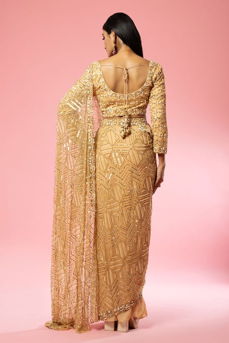 Shop Quench A Thirst Gold Georgette, Net Embroidery, Cut Work Pre-stitched Saree With Pearl Blouse at Aza Fashions Shop_Quench A Thirst_Gold Georgette, Net Embroidery, Cut Work Pre-stitched Saree With Pearl Blouse _at_Aza_Fashions