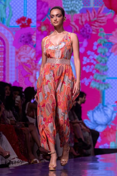 Shop Krisha Sunny Ramani Orange Crepe Crystals V-neck Floral Pattern Draped Jumpsuit at Aza Fashions Shop_Krisha Sunny Ramani_Orange Crepe Crystals V-neck Floral Pattern Draped Jumpsuit _at_Aza_Fashions