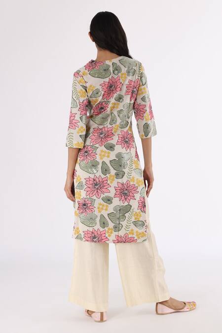 Shop Nakita Singh Off White Satin, Silk Embroidery, Sequins Round Neck Lotus Kurta And Pyjama Set at Aza Fashions Shop_Nakita Singh_Off White Satin, Silk Embroidery, Sequins Round Neck Lotus Kurta And Pyjama Set_at_Aza_Fashions