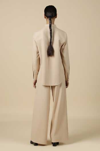 Shop Shahin Mannan Beige Linen Embroidery Shawl Neck Measuring Tape High Low Shirt With Pant at Aza Fashions Shop_Shahin Mannan_Beige Linen Embroidery Shawl Neck Measuring Tape High Low Shirt With Pant _at_Aza_Fashions