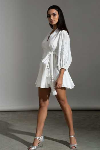 Shop Amrta By Guneet Kondal White Cotton, Silk, Viscose Embroidery, Tassels V-neck Santorini Flower Dress at Aza Fashions Shop_Amrta By Guneet Kondal_White Cotton, Silk, Viscose Embroidery, Tassels V-neck Santorini Flower Dress _at_Aza_Fashions