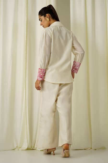Shop Sakshi Khetterpal Ivory Chanderi Pearls, Beads, Embroidery Collared Shirt And Pant Set at Aza Fashions Shop_Sakshi Khetterpal_Ivory Chanderi Pearls, Beads, Embroidery Collared Shirt And Pant Set _at_Aza_Fashions
