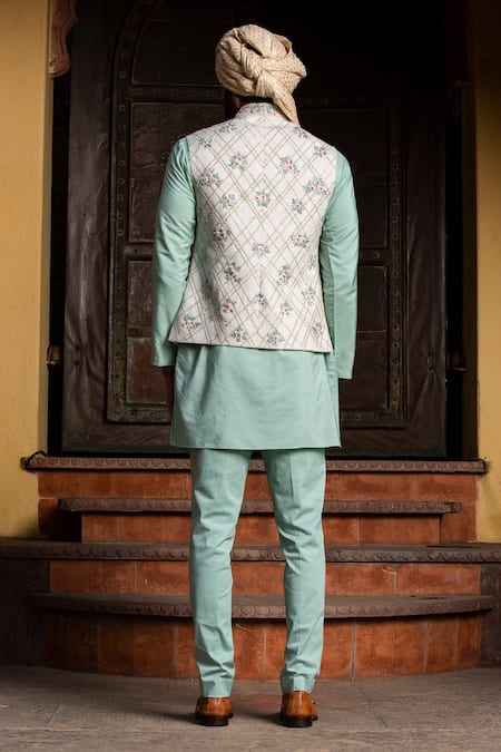 Shop_Nitika Gujral_Ivory Silk, Viscose, Lycra Embroidery Floral Bundi Kurta Set _at_Aza_Fashions