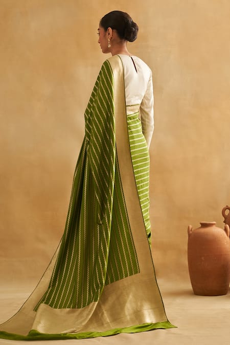 Shop Taisha Cream Satin Tassels Round Neck Pure Silk Blouse at Aza Fashions Shop_Taisha_Cream Satin Tassels Round Neck Pure Silk Blouse _at_Aza_Fashions