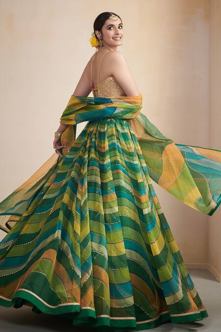 Shop Cedar & Pine Green Organza Mukaish, Sequin And Thread Work, Waves Print Plunge V Lehenga Set at Aza Fashions Shop_Cedar & Pine_Green Organza Mukaish, Sequin And Thread Work, Waves Print Plunge V Lehenga Set_at_Aza_Fashions