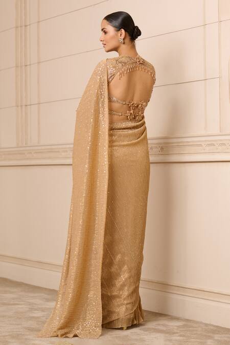 Shop_Tarun Tahiliani_Gold Crepe Sequins Round Neck Crinkle Net Embroidered Saree With Blouse_at_Aza_Fashions