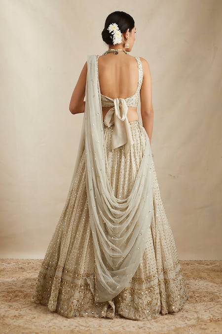 Shop Astha Narang Green Chanderi Silk Sequins V-neck Sitara Embroidered Bridal Lehenga Set at Aza Fashions Shop_Astha Narang_Green Chanderi Silk Sequins V-neck Sitara Embroidered Bridal Lehenga Set _at_Aza_Fashions