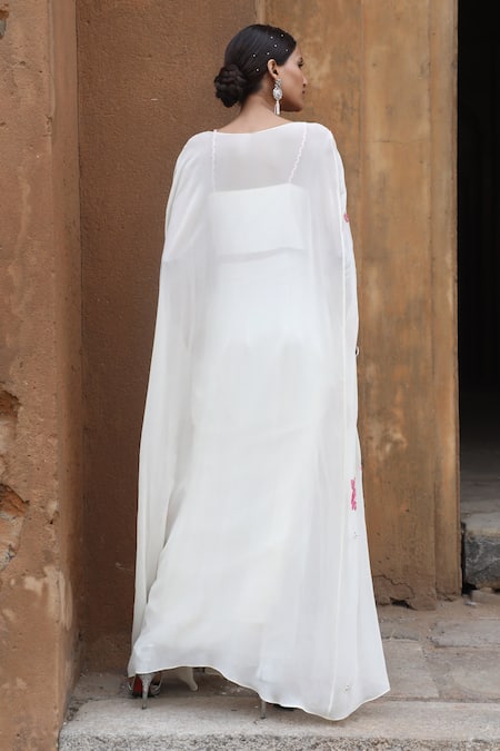 Shop_Nitisha Kashyap Official_Ivory Crepe, Georgette Sequins, Beads Sweetheart Neck Embroidered Cape Skirt Set _at_Aza_Fashions