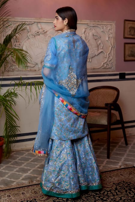 Shop Atelier Shikaarbagh Blue Brocade, Silk Organza Embroidery, Zari Floral Pattern Kurta Gharara Set at Aza Fashions Shop_Atelier Shikaarbagh_Blue Brocade, Silk Organza Embroidery, Zari Floral Pattern Kurta Gharara Set _at_Aza_Fashions