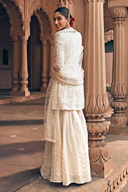 Shop Preevin Off White Cotton, Net Embroidery, Mirrors V-neck And Thread Sharara Set at Aza Fashions Shop_Preevin_Off White Cotton, Net Embroidery, Mirrors V-neck And Thread Sharara Set _at_Aza_Fashions
