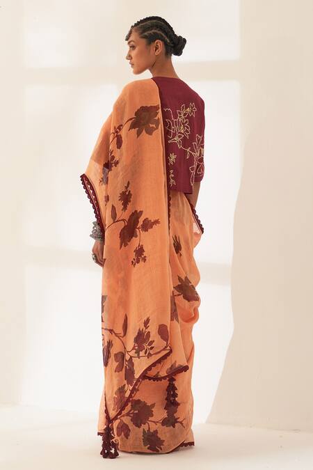 Shop Kasturi Kundal Orange Linen Tassels, Kunjan Pure Handloom Saree With Unstitched Blouse at Aza Fashions Shop_Kasturi Kundal_Orange Linen Tassels, Kunjan Pure Handloom Saree With Unstitched Blouse_at_Aza_Fashions