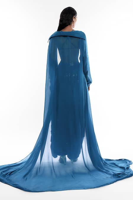 Shop Deme By Gabriella Blue Georgette, Chiffon Fabric Flowers, Long Cape And Embellished Harem Pant Set at Aza Fashions Shop_Deme By Gabriella_Blue Georgette, Chiffon Fabric Flowers, Long Cape And Embellished Harem Pant Set _at_Aza_Fashions