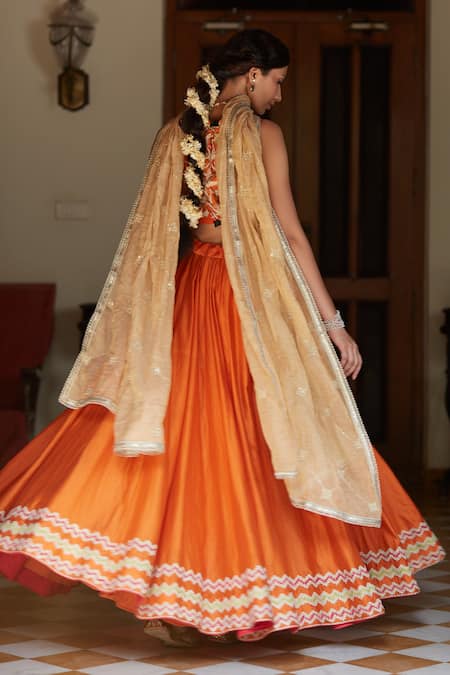 Shop Vashisht Guru Dutt Orange Handloom Chanderi, Raw Silk And Tissue Floral, Chevron Border Lehenga Set at Aza Fashions Shop_Vashisht Guru Dutt_Orange Handloom Chanderi, Raw Silk And Tissue Floral, Chevron Border Lehenga Set _at_Aza_Fashions