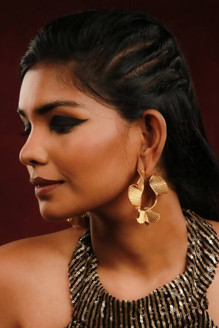 Shop Ishhaara Gold Plated Wave Shaped Hoops at Aza Fashions Shop_Ishhaara_Gold Plated Wave Shaped Hoops _at_Aza_Fashions
