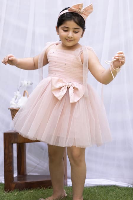 Shop Darleen Kids Couture Pink Net, Taffeta Sequins, Beads Amaya Embellished Bow Dress at Aza Fashions Shop_Darleen Kids Couture_Pink Net, Taffeta Sequins, Beads Amaya Embellished Bow Dress _at_Aza_Fashions