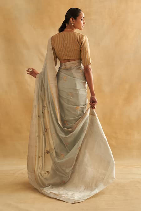 Shop Taisha Gold Silk V-neck Zari Handwoven Stripe Blouse at Aza Fashions Shop_Taisha_Gold Silk V-neck Zari Handwoven Stripe Blouse _at_Aza_Fashions