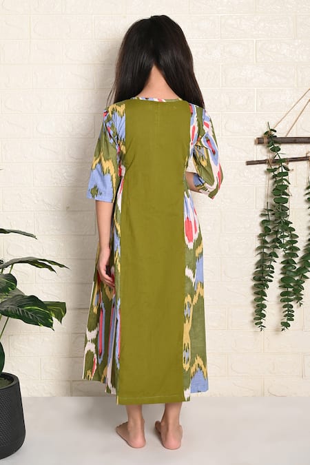 Shop THE COTTON STAPLE Green Cotton Tassels Peasant Waist Tie Dress at Aza Fashions Shop_THE COTTON STAPLE_Green Cotton Tassels Peasant Waist Tie Dress _at_Aza_Fashions